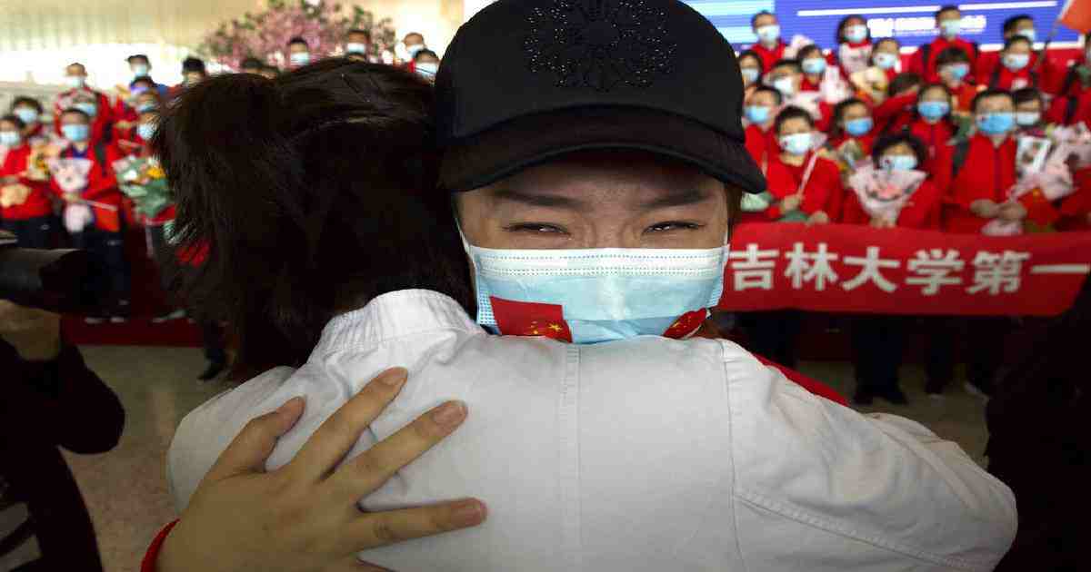 Masked crowds fill streets and trains in post-lockdown Wuhan 