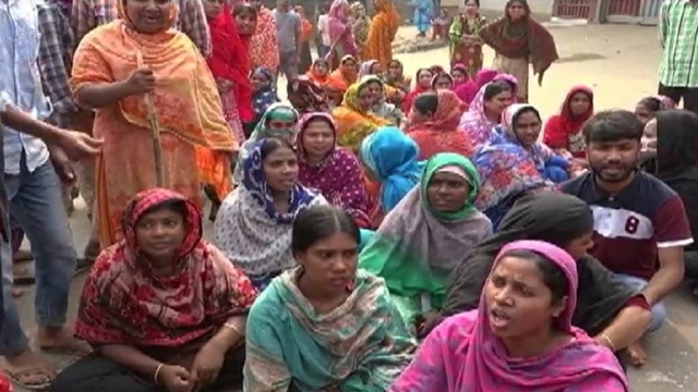 RMG workers block road in Savar