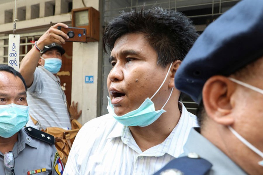 Myanmar charges journalist under terrorism law, blocks news websites