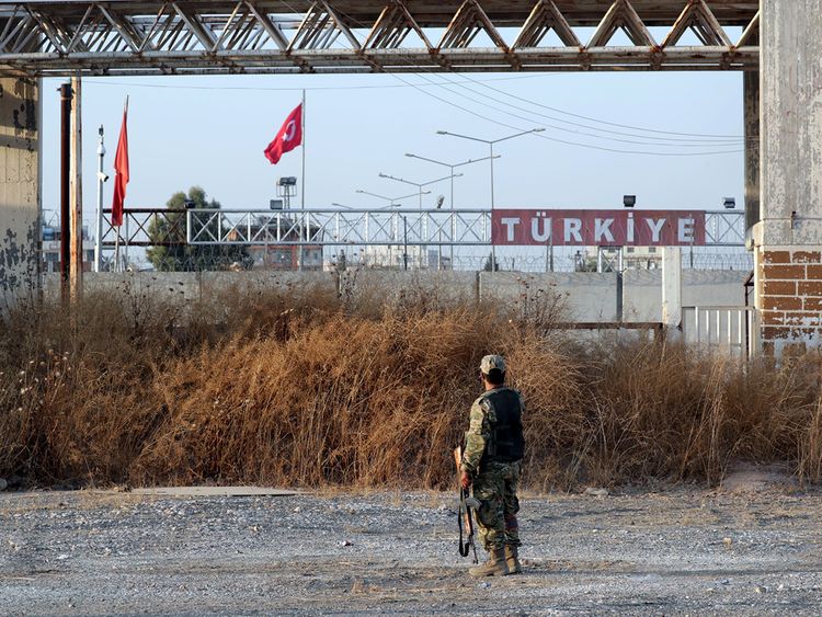 Kurds announce deal with Damascus as Turkey pushes deep into Syria