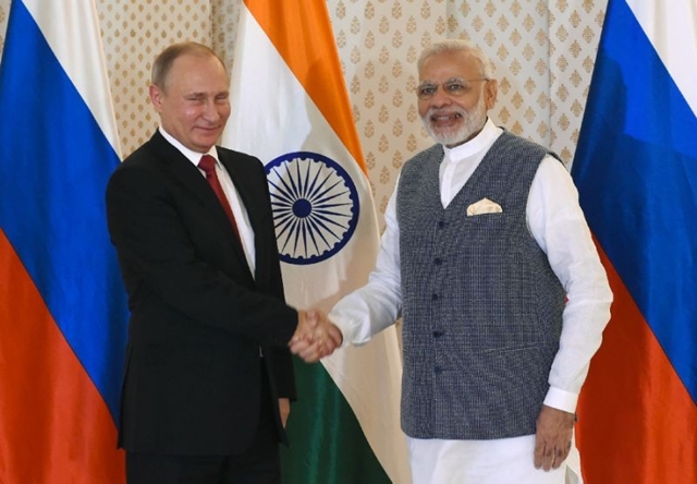 US, China look on as Putin seeks India arms deals