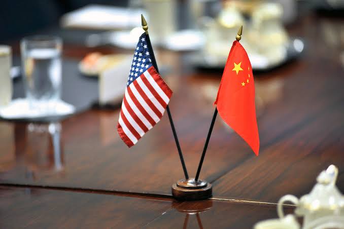 China expels American journalists as spat with US escalates