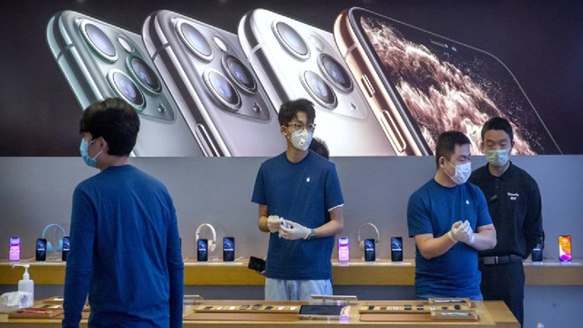 Apple warns China virus will cut iPhone production, sales