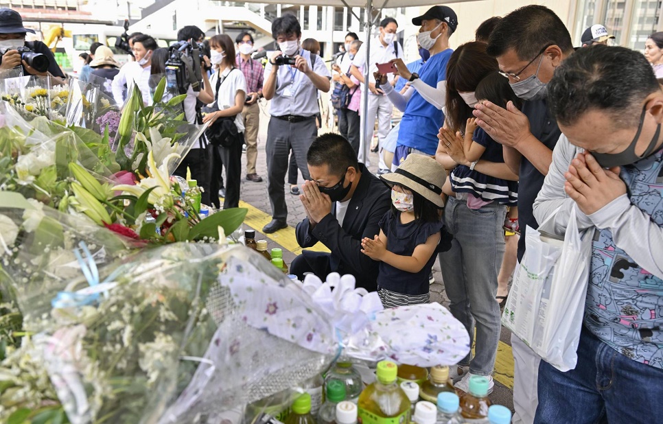 Japan mourns as body of assassinated PM Abe returns to Tokyo