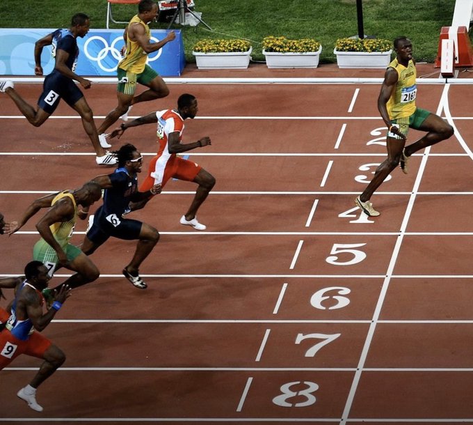 Bolt goes viral with 'social distancing' Olympic photo