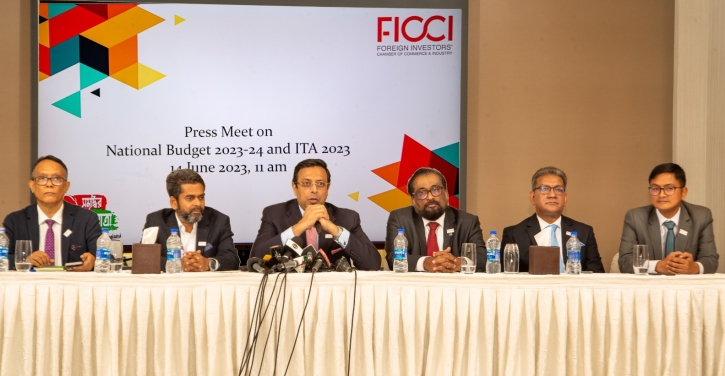 Reduce tax burden on individuals and corporates: FICCI