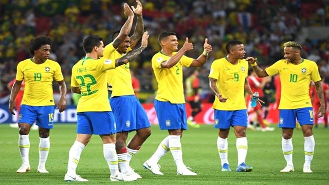 Thiago, Paulinho steer Brazil into World Cup's last 16