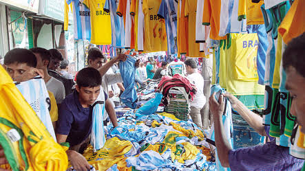 Sale of jersey, flag goes up as soccer fever grips fans