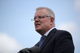 Australian PM warns of lockdowns to tackle coronavirus.